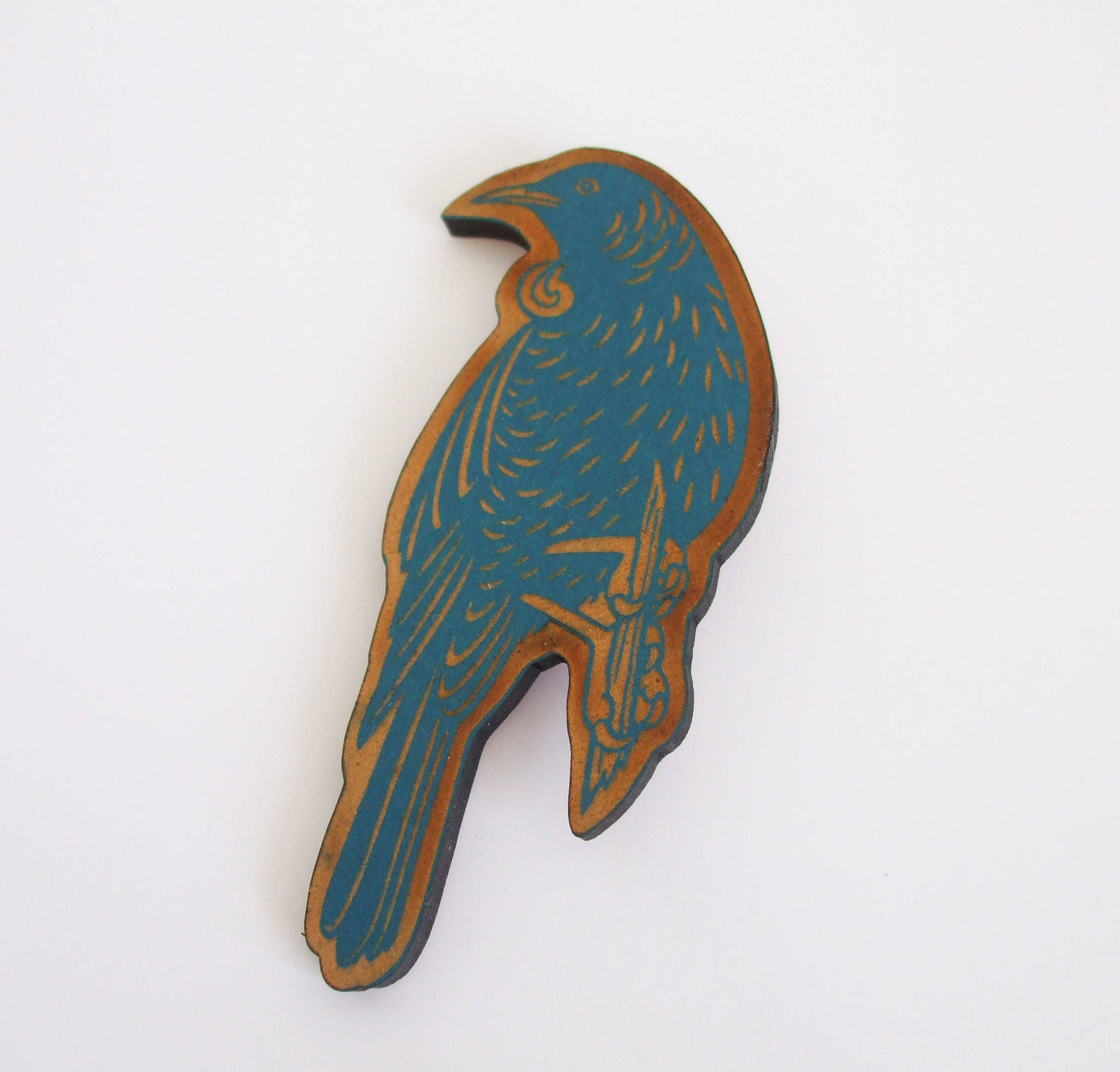 Tui Brooch