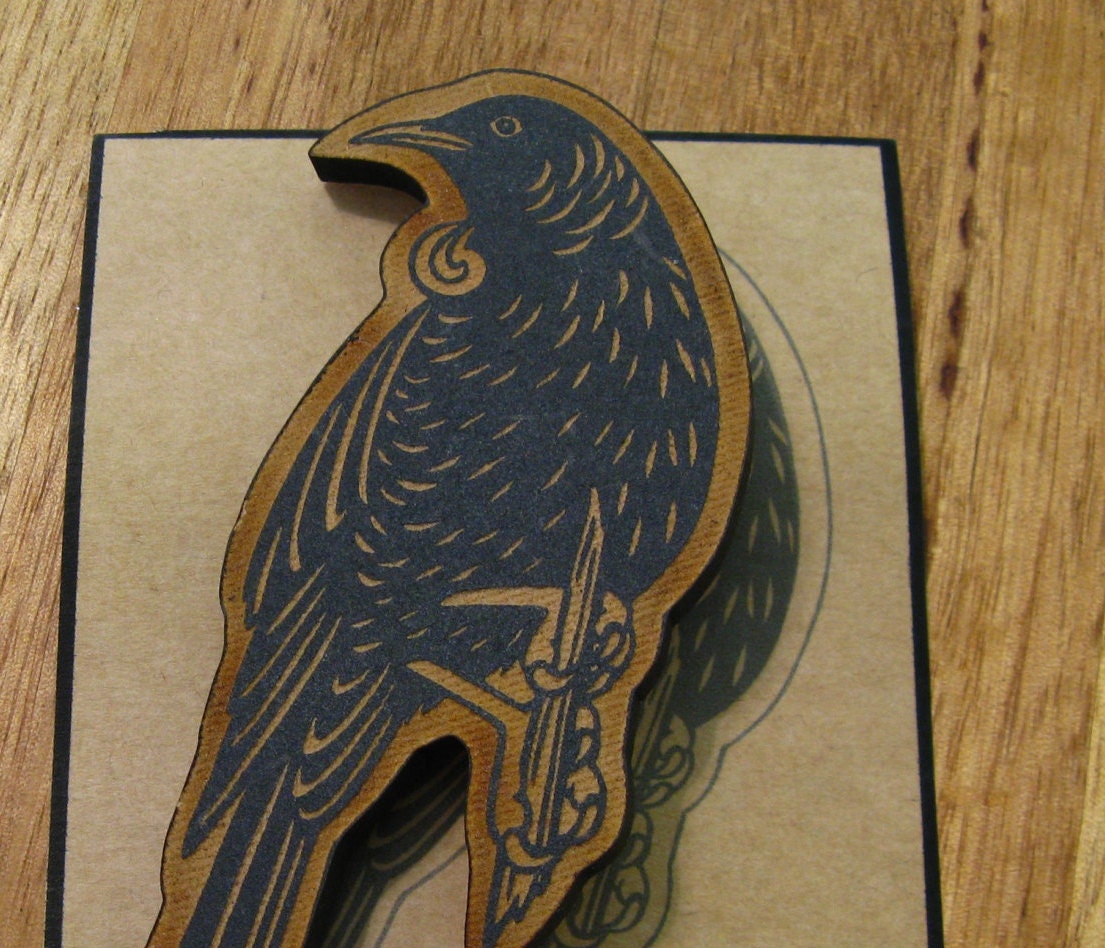 Tui Brooch